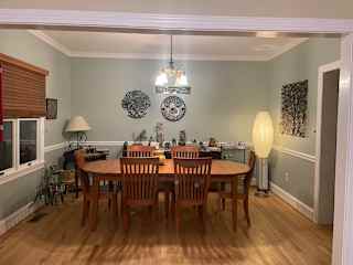 Dining room opens to living room and kitchen