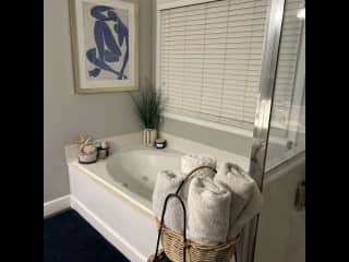 Master bathroom with tub & shower
