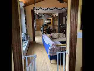 Open living room, dining, well equipped kitchen