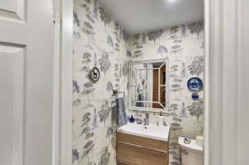 A small powder room downstairs.