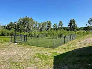 outdoor pet play and exercise area at back of complex