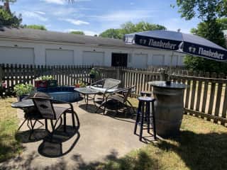 Backyard patio with seating for 6-8, fire pit, Fenced.