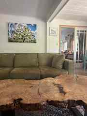 Living area and French doors to foyer