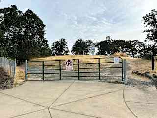 View of the park from the street side. It's nice place to stretch your legs and from here you have a view of both the Cascade and Coastal Ranges.