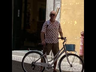 Michael, on a cycle ride in the medieval town of Lucca, Italy.