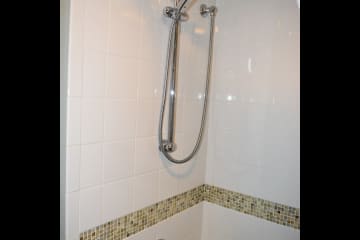 Shower. House is one and a half bath with washer/dryer off kitchen