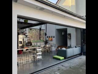 The folding glass doors open all the way - in August you’ll probably just leave it like that!