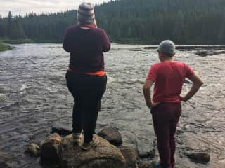 Gina and Taylor exploring the river while on a fishing trip in northen Quebec.