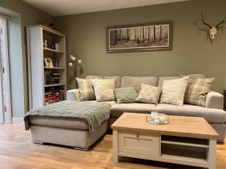 Comfy sofa to relax and watch the selection of DVDs or read a good book