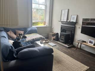 TV room. Sofa is really comfy with stove and built in desk. Tv has Netflix, Disney +, paramount plus, and sky sports.