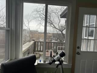 Deck off the sunroom and feel free to use the telescope to gaze at the stars or the moon at night.