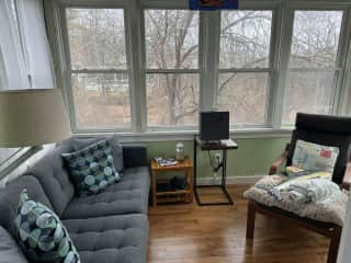 Sunroom. Lots of bird watching here or good place to curl up and read a book