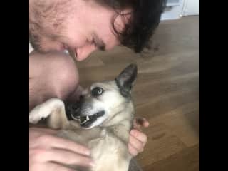 Adam playing with our dog, Cookie!