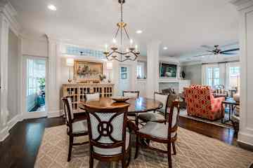 Round dining table that expands to seat up to 8 comfortably.
