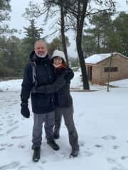 Me and my husband in the mountains with snow. We love the nature!
