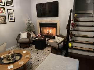 Living room with a working fireplace.