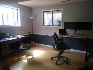 Office area. Two desks with office chairs (One desk is a sitting/standing desk). 1 Gig-speed internet so perfect if you need to work during your stay.