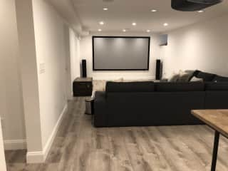 basement w/ 4k cinema projector (apple tv w/ netflix, disney+, amazon prime, hulu, etc)