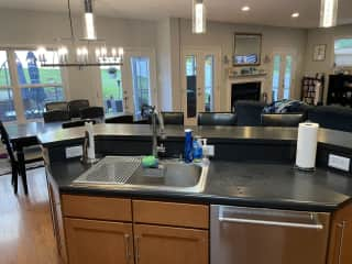 From kitchen looking into dining room and living room