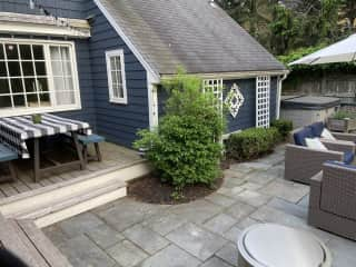 Backyard patio and picnic table.