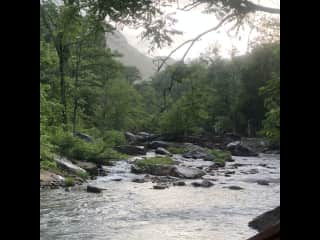 The river in front of the house.