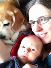 My wife and baby with Kimba (our 14 yr old beagle)