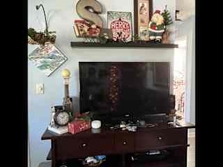 TV decorated for Christmas