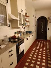 Part of the kitchen. We don't own a dishwasher. We only have a very small freezer.