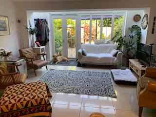 Downstairs living area, comfy sitting and digital TV and Alexa. Access to patio garden.