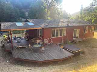 We love our big porch for enjoying meals, hula hooping and soaking in the hot tub.