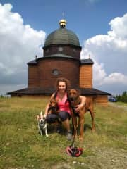 Veronika and her pack hiking in Czech mountains