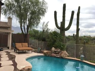 The back yard and pool with mountain view