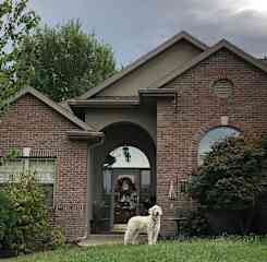 Front of the house - with greeter Chester