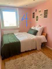 Queen bed in the smaller bedroom.