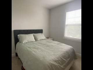 Guest bedroom upstairs. Dresser drawers and closet. Queen bed. New bedding.