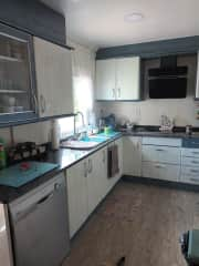 Fully fitted kitchen with oven hob microwave and dishwasher