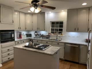 Large kitchen with eat-in breakfast area, recently updated with new counters and floors