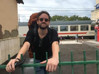 Jake waiting at the train station in Albinia, Italy
