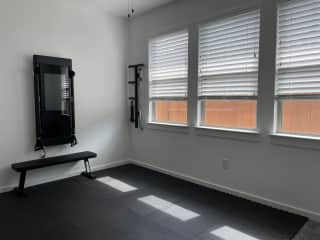 Our home gym space includes Apple Fitness as well as the Tonal.