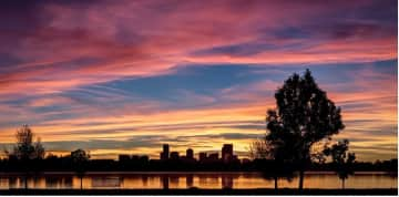 Beautiful mountain and city view sunsets at Sloans Lake