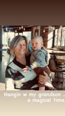 Me with my grandson this year. He’s my first grandchild, and the light of my life.