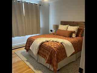 Guest room 1 of 2, queen bed