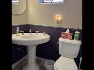 Upstairs half bath.