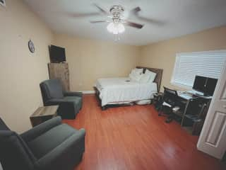 Guest bedroom (where you’d stay) - this room has a queen bed. There’s also a drum set and a standing desk in this room now, I need to update the photo.