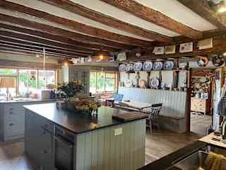 Our kitchen, fitted with a 4 oven Everhot cooker and an electric oven in the island units.