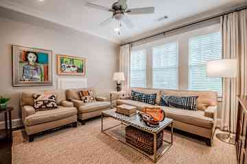 Family room on the 2nd floor has a super comfortable couch and a big screen TV.