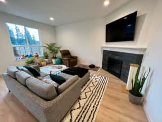 Open living space with tree-lined views