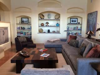 Living room with wood-burning fireplace