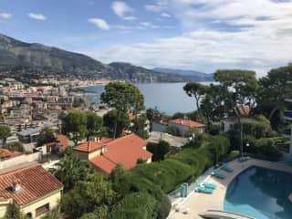 View from our 4th floor balcony:  pool, Med, Mts.