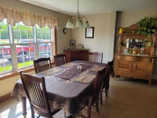 Large Dining Area.  Table will sit 8.